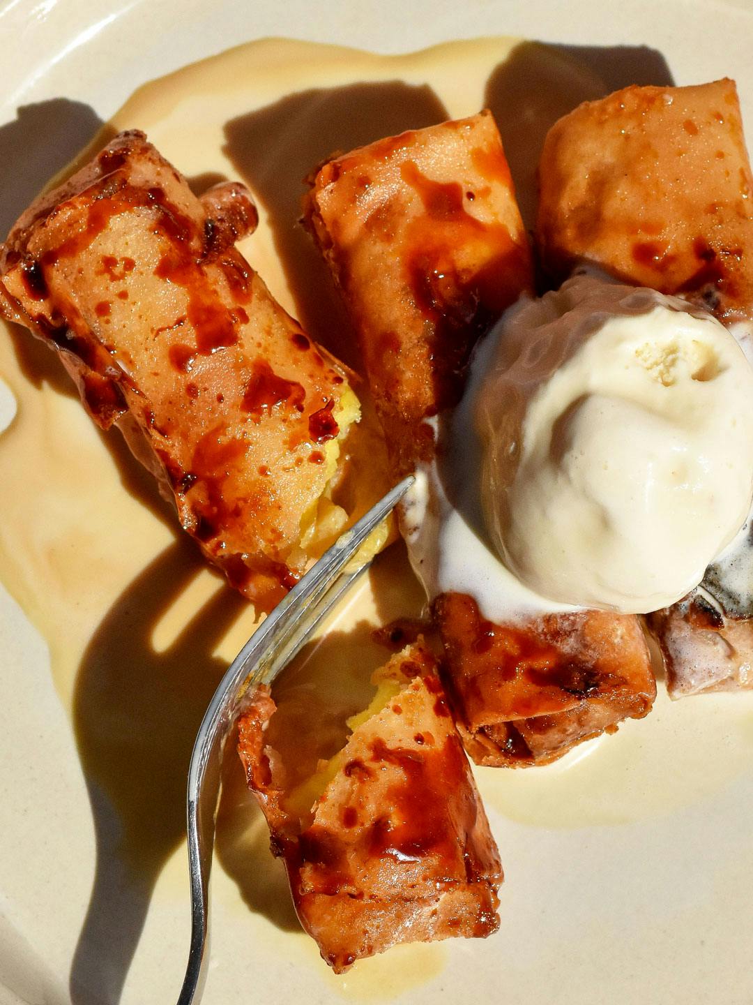 vegan turon with ice cream and a fork