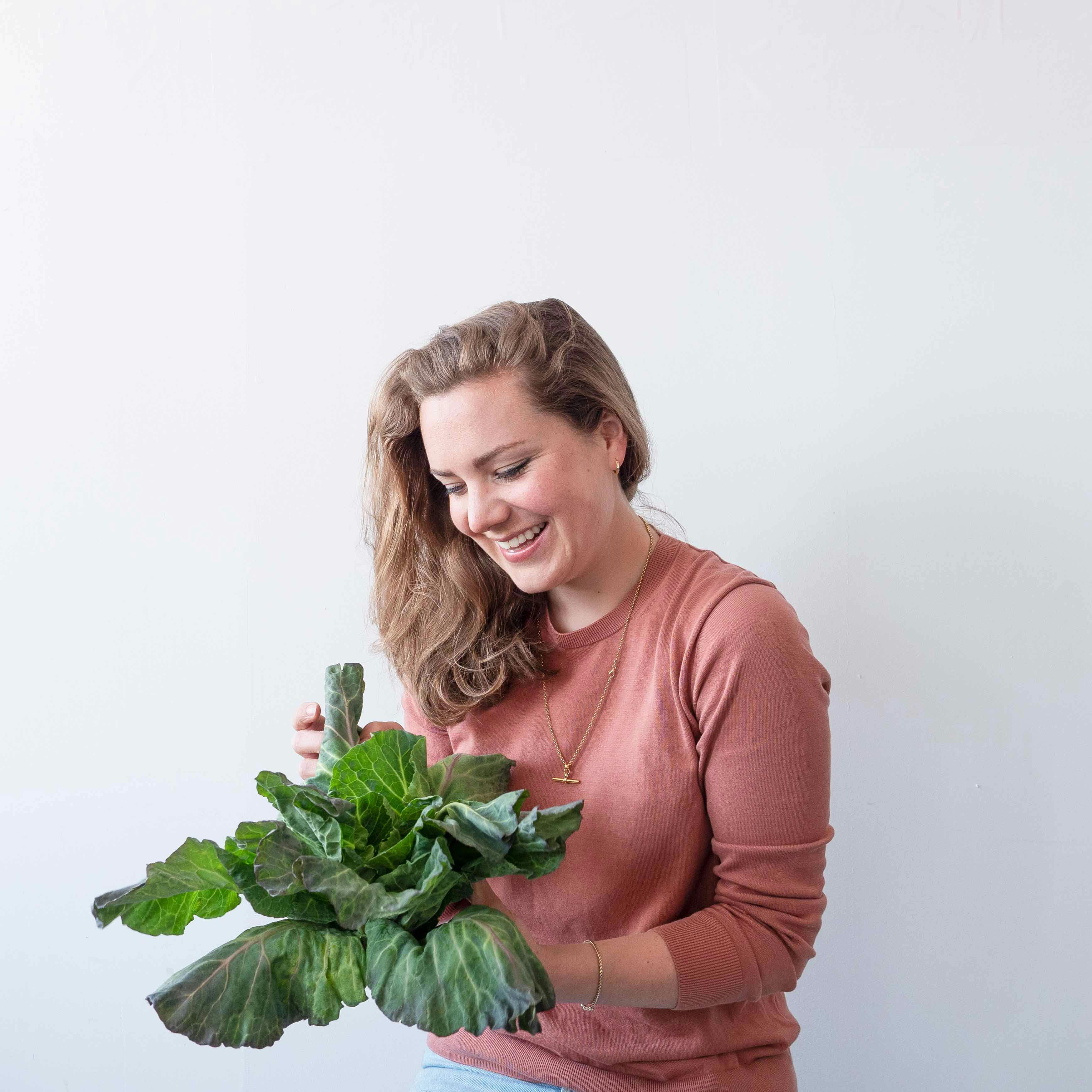 joey, our senior development chef, holding a cabbage