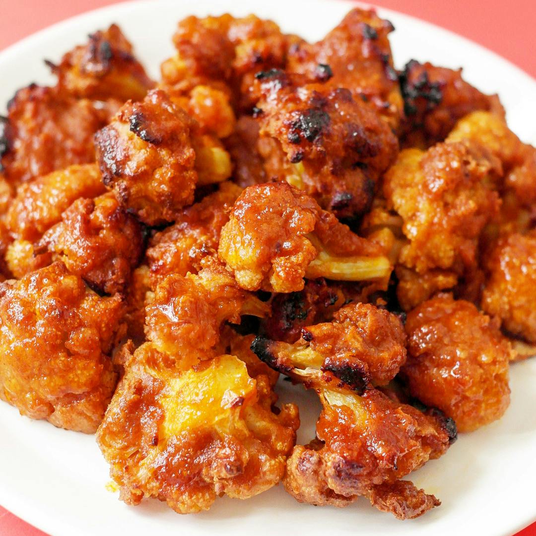 buffalo cauliflower bites served on a plate