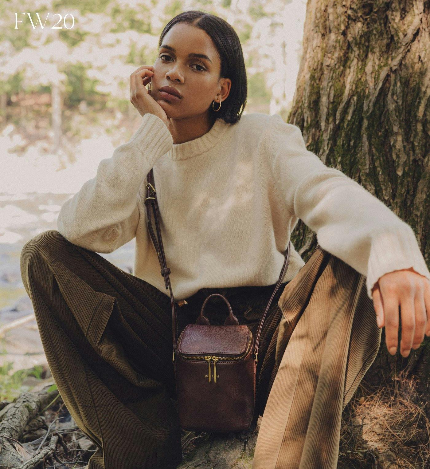 Model with matt and nat bag