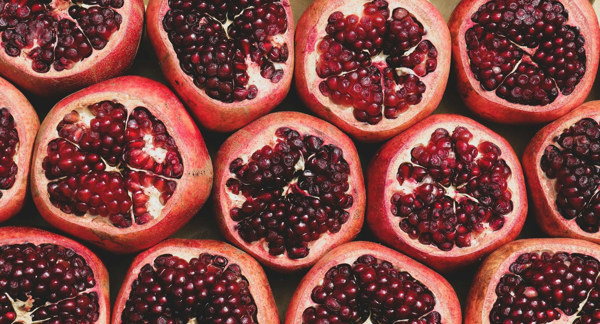 halved pomegranates