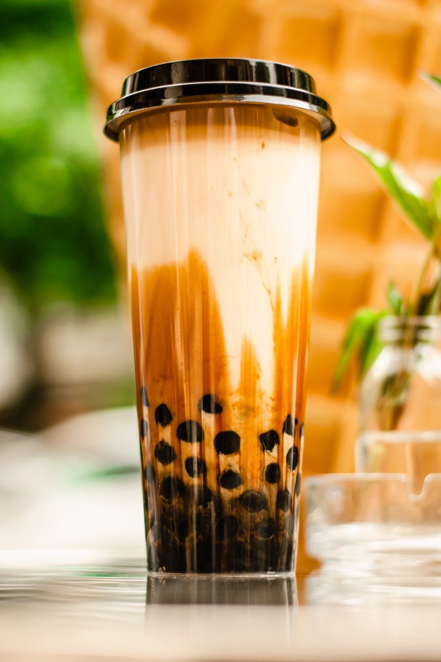 tall glass of bubble tea with boba