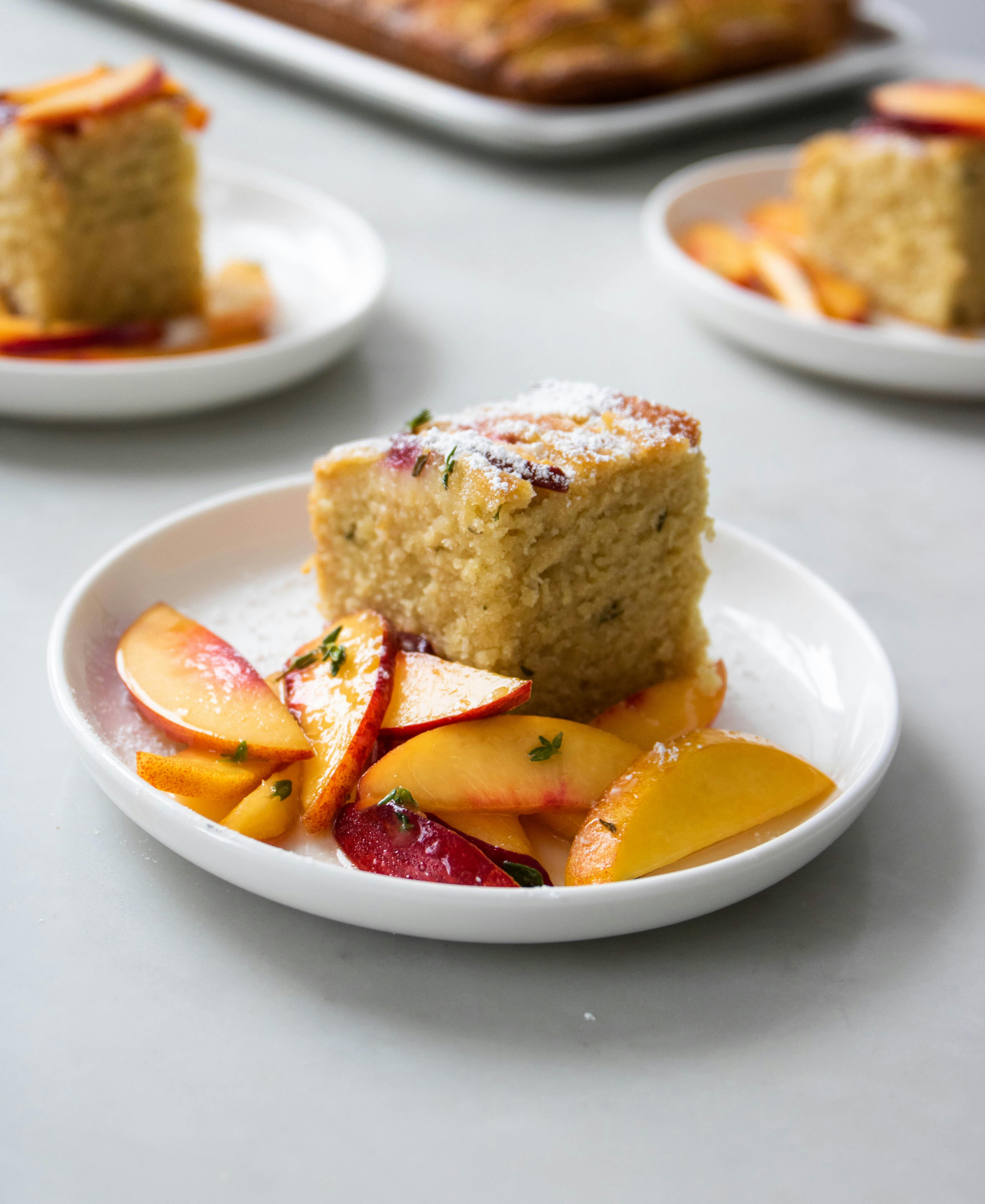 cake with peaches on plate