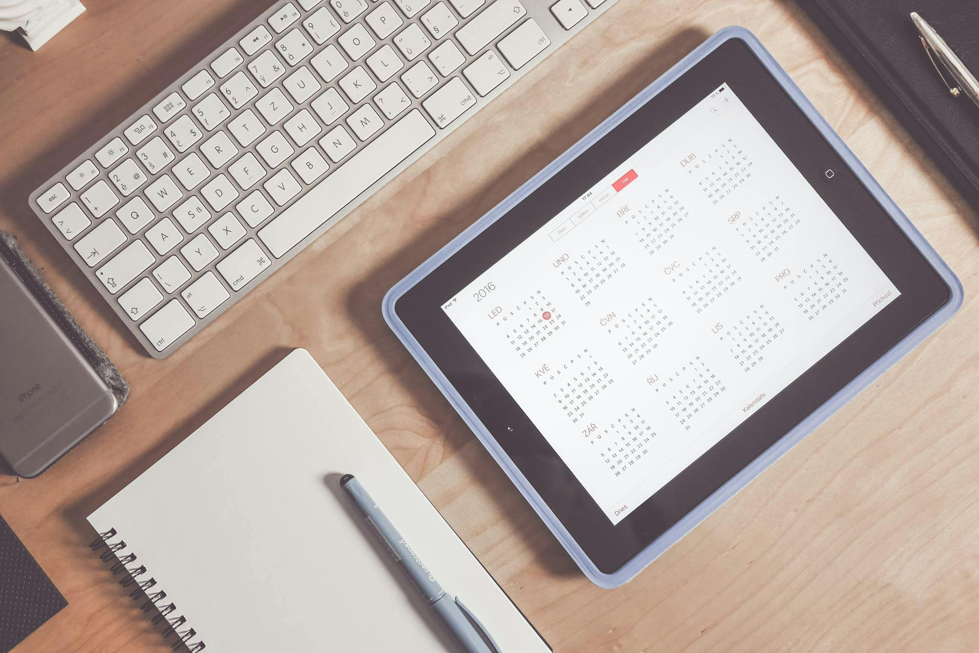 calendar, keyboard and notepad