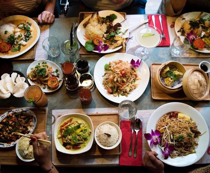 spread of vegan chinese food on table