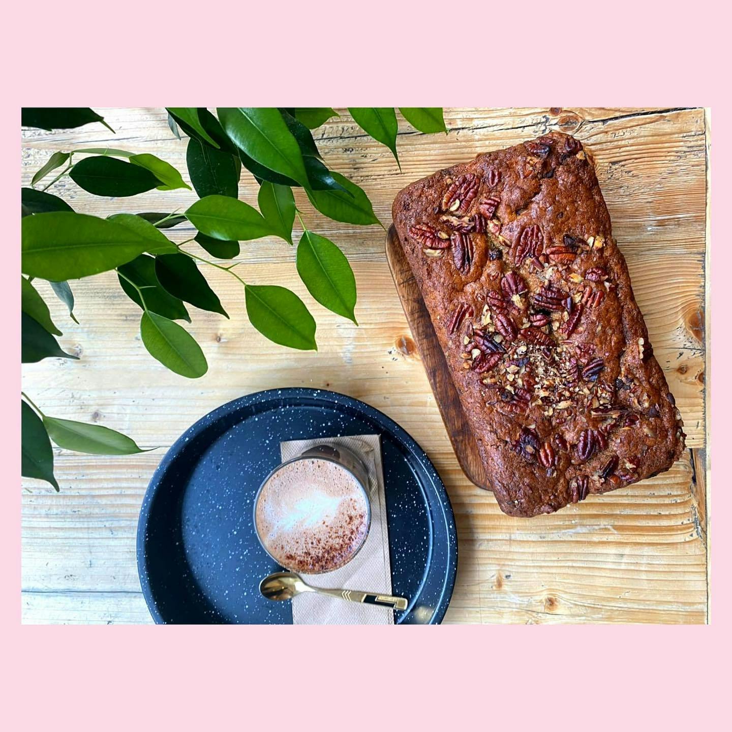 Banana bread and coffee on wooden table