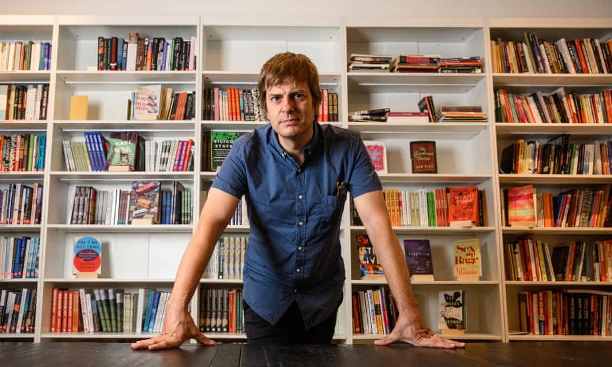 man infront of books