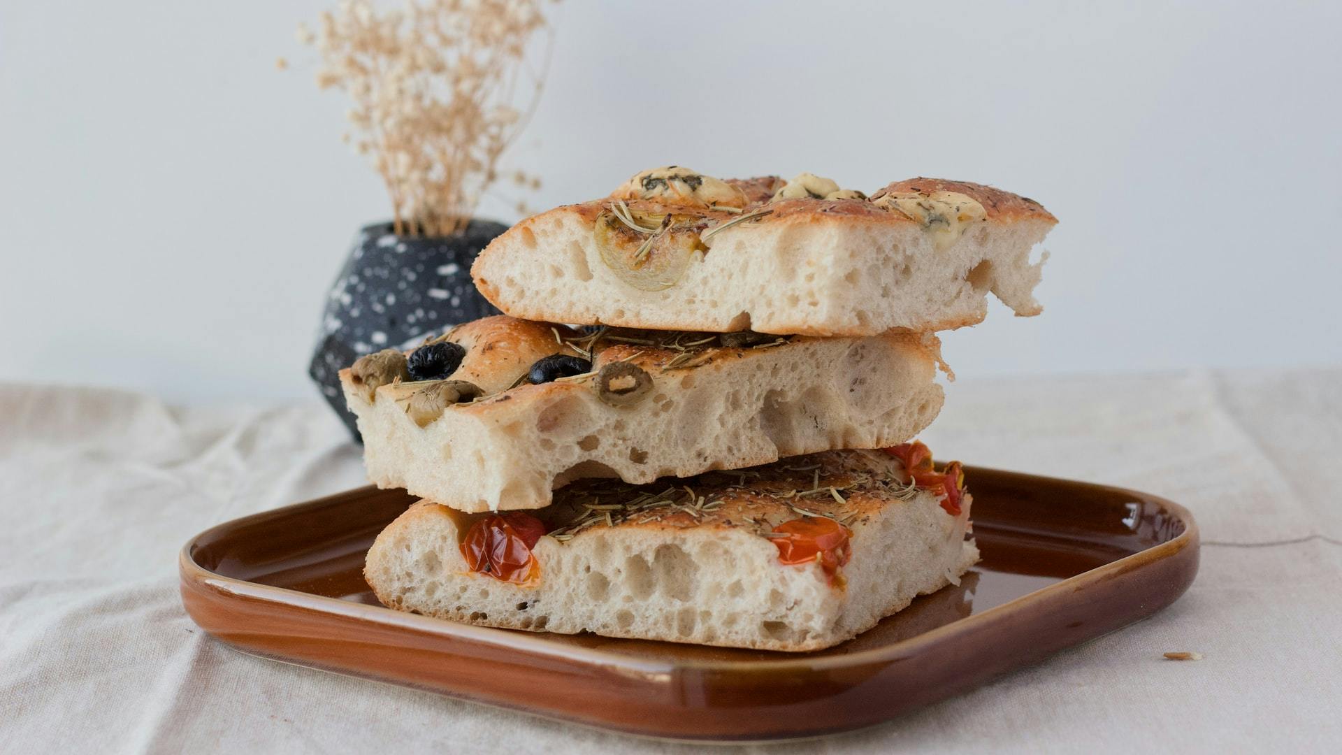 a plate of focaccia slices