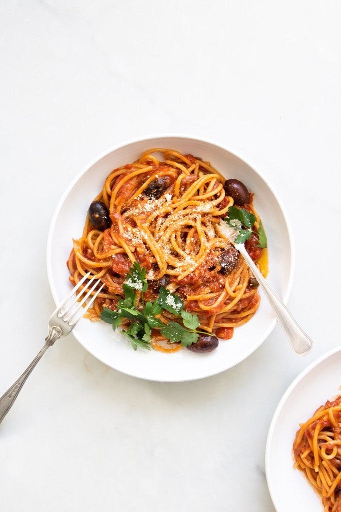 bowl of puttanesca with fork