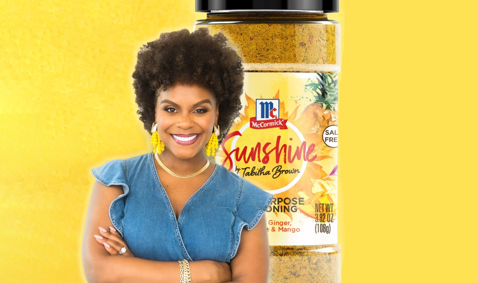 Tabitha Brown with bottle of spice blend