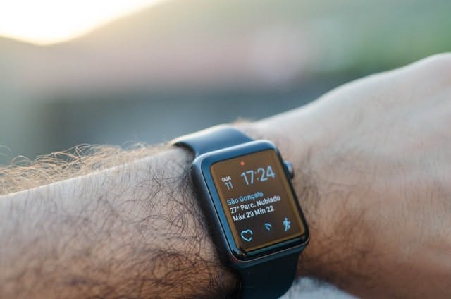 wrist with a smart watch on it