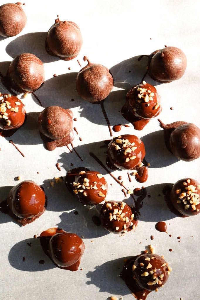 chocolate tahini truffles on white background