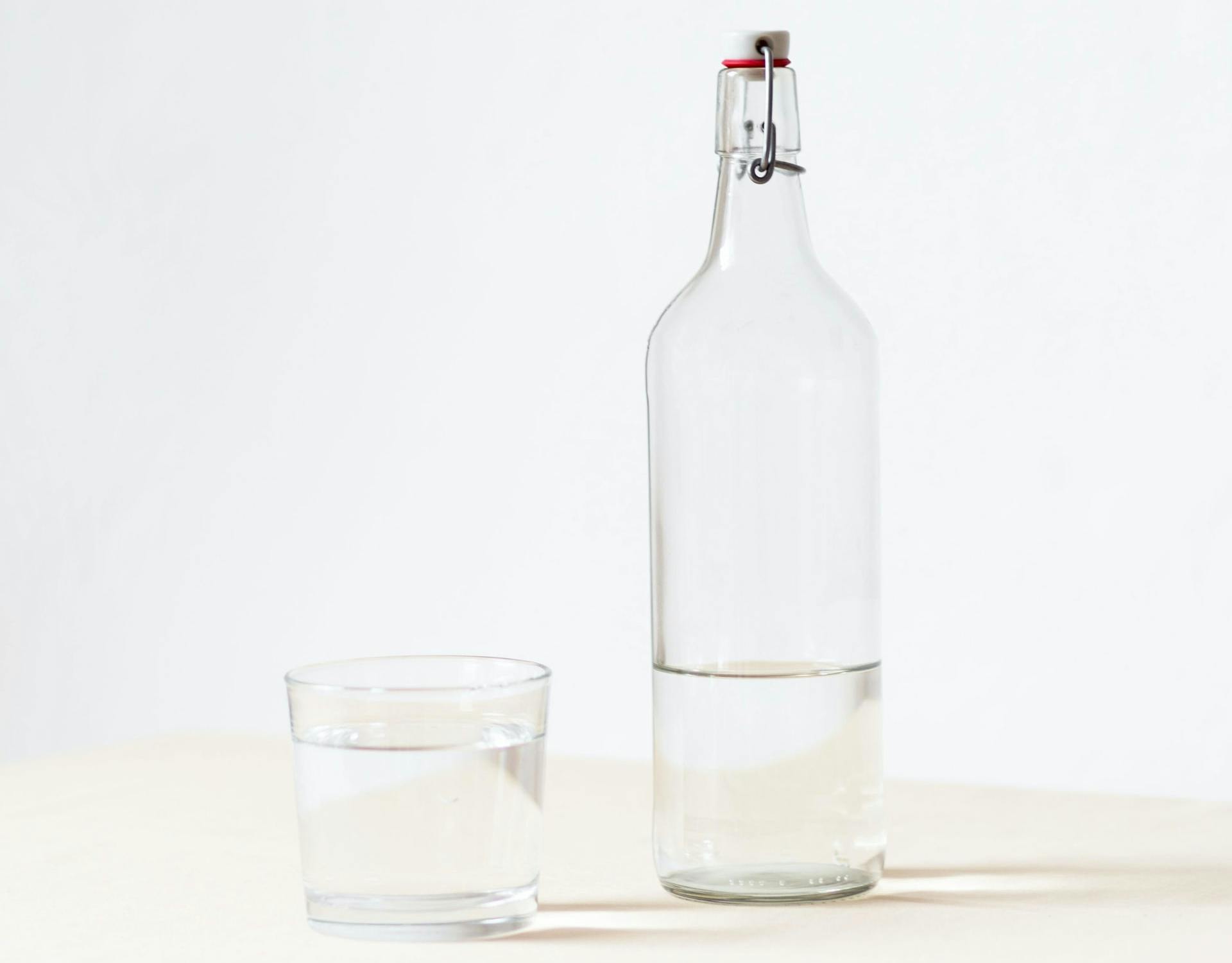 glass and water bottle