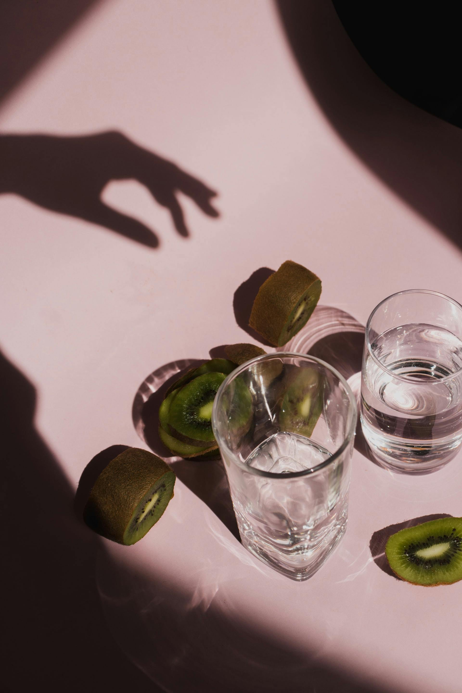 kiwi and glasses of water