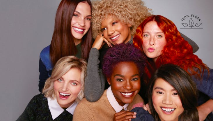 women posing with different coloured hair