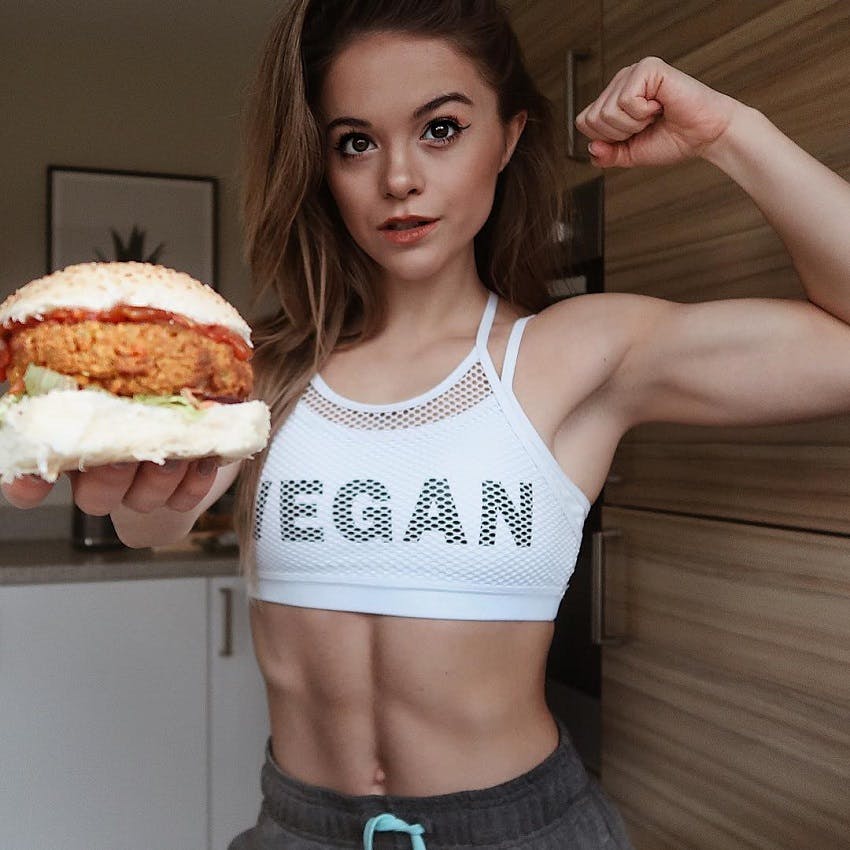 Stefanie holding vegan burger