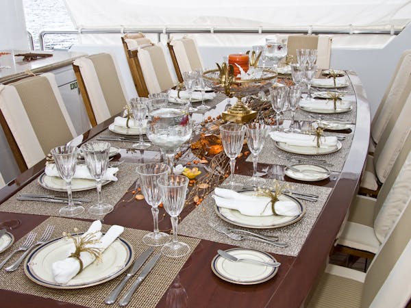 Formal table setting on chartered yacht