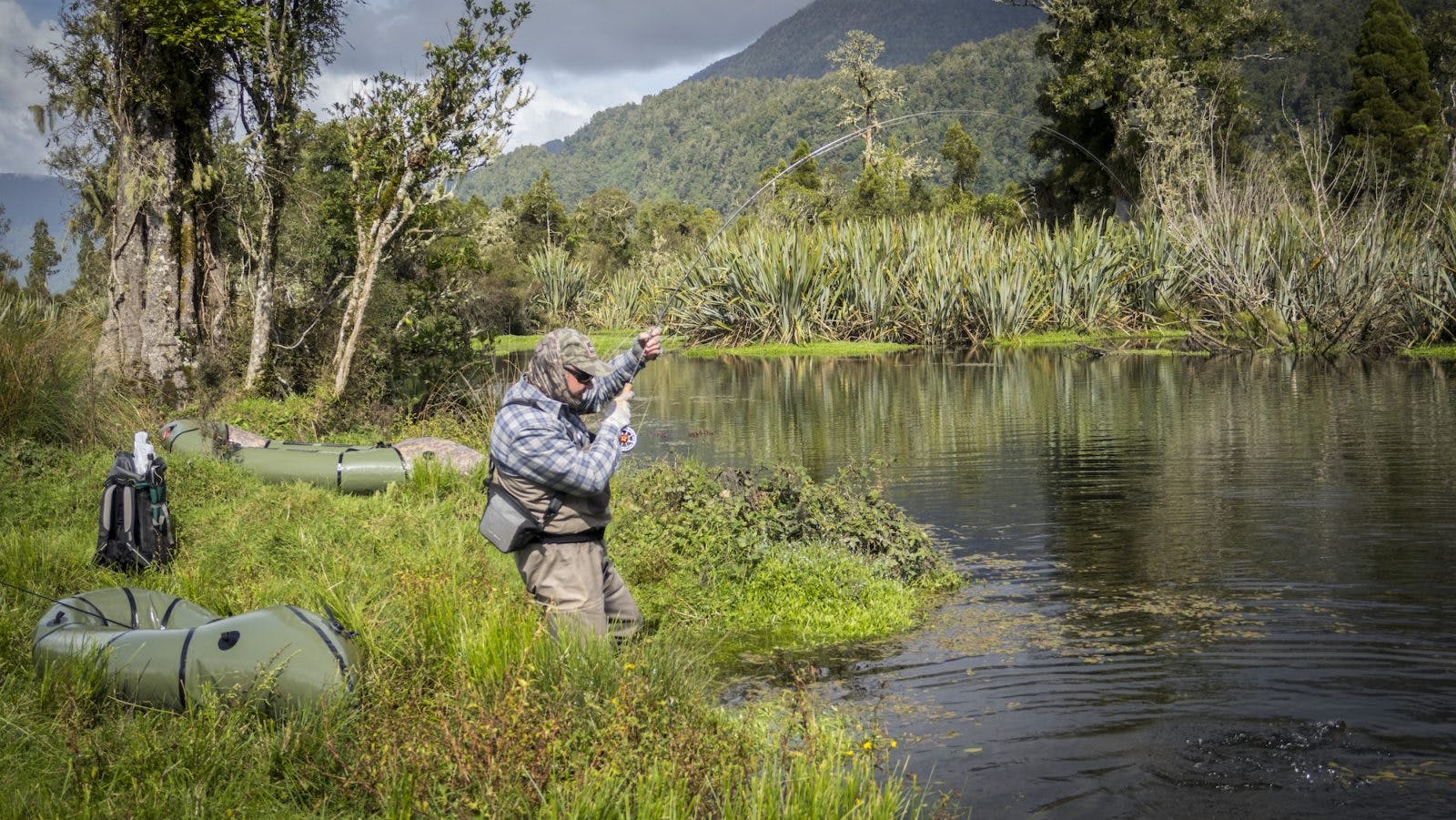 Hookup! Paddling up a remote spring creek only accessible by raft pays off with a nice brown spotted cruising past the rafts... I&apos;m sure nobody has ever fished here!