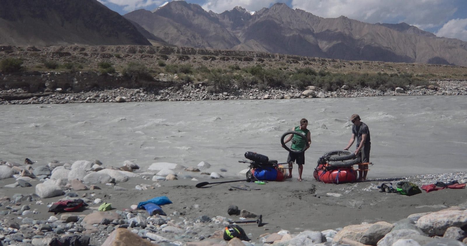 Mike McGrath pack rafting the Sary Jaz River, Kyrgyzstan.
