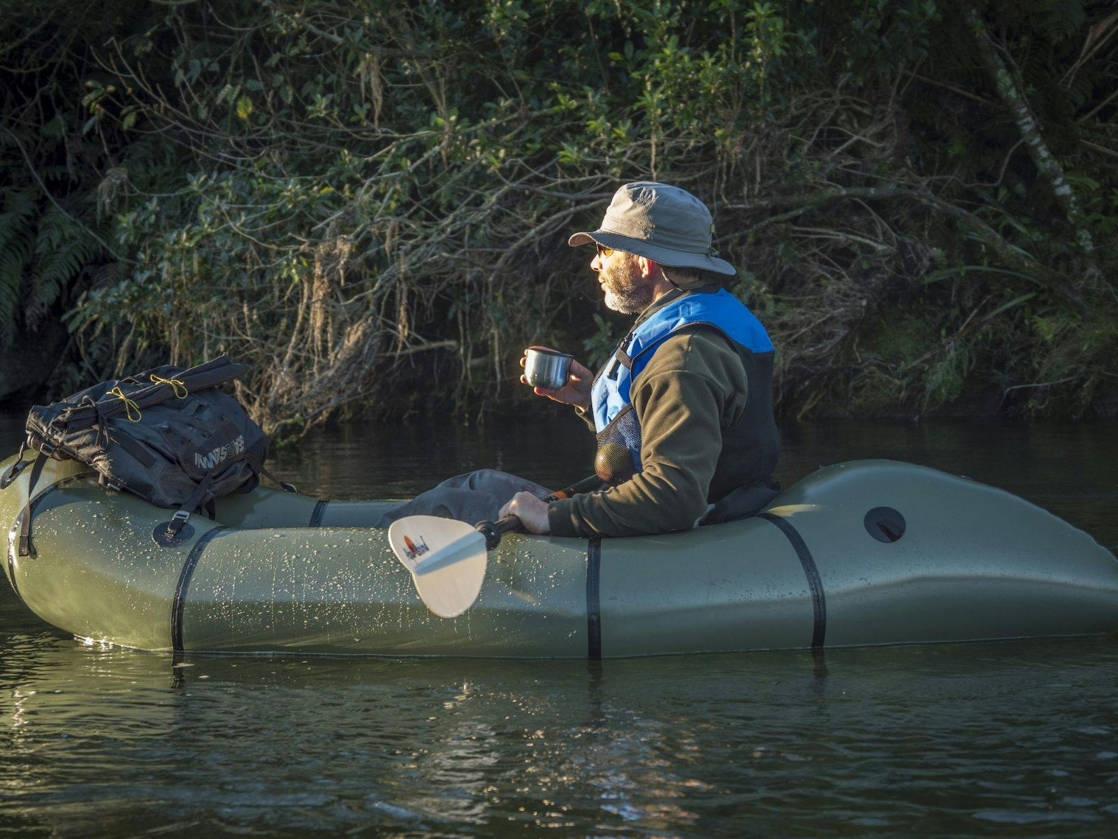 Dan doing his favourtite thing in the world, sipping a cup of tea and floating down a river... (1)