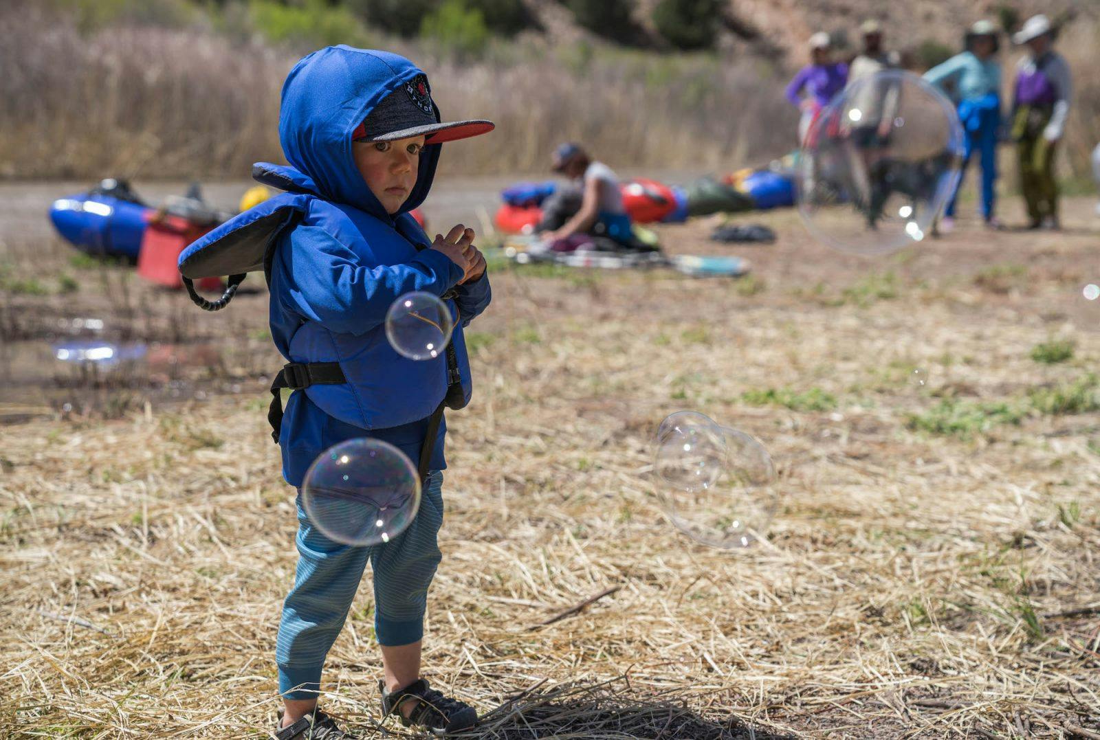 Thorne Phillips playing with bubbles at Camp 2.