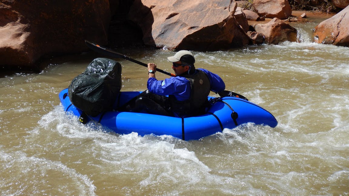 &quot;Tom paddling out on day six. If you take this route, you will need to haul all your gear through &#x201C;crack in the rock&#x201D; high above the river level, which is the last exit unless you paddle to the lake. A 50&#x2019; rope is a key tool on that exit, since your gear won&#x2019;t fit through the crack, you&#x2019;ll need to climb through first and haul packs over the lip.&quot;