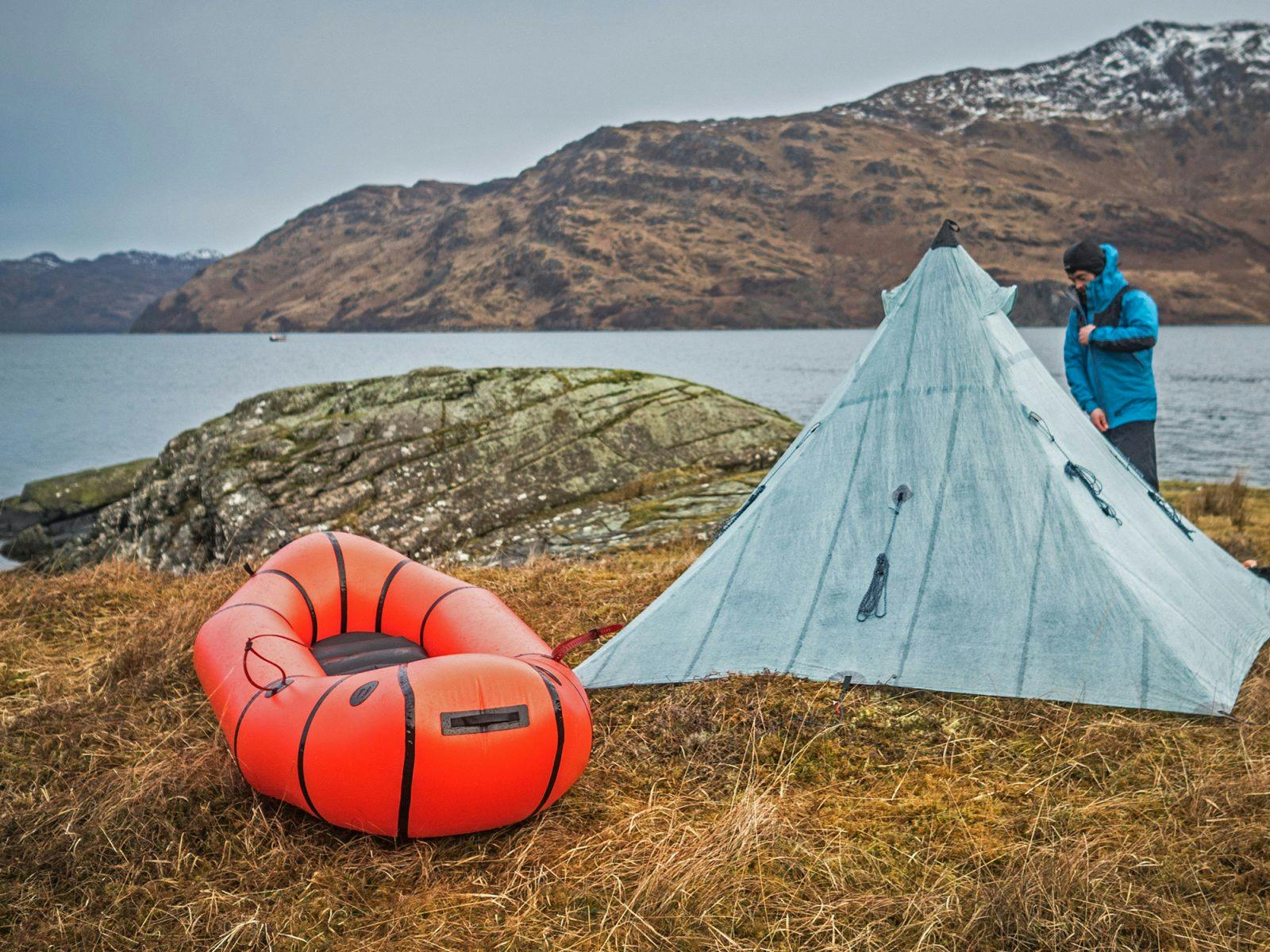 Huw Oliver at camp while on a bikerafting trip. Photo: Annie Lloyd-Evans.