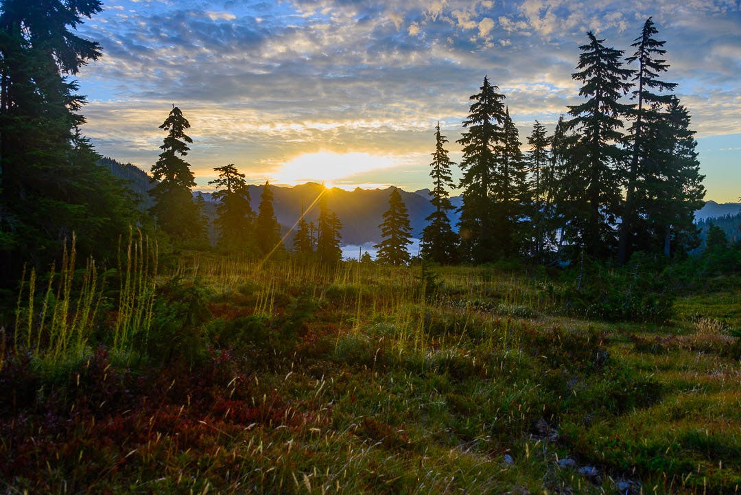 Sunrise over the Olympic Mountains from our first camp on the High Divide Trail.&#xA0; These were the first clouds to roll in and the last we would see of the sun for the remainder of the trip.