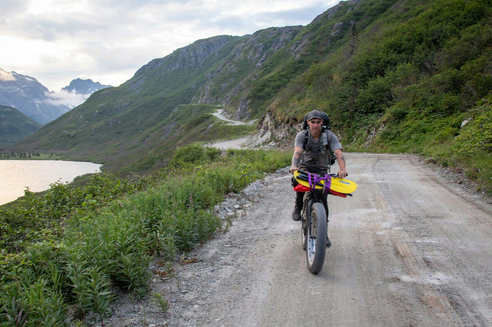 Brent biking the Pile Bay-Williamsport Road from Cook Inlet to Lake Iliamna.