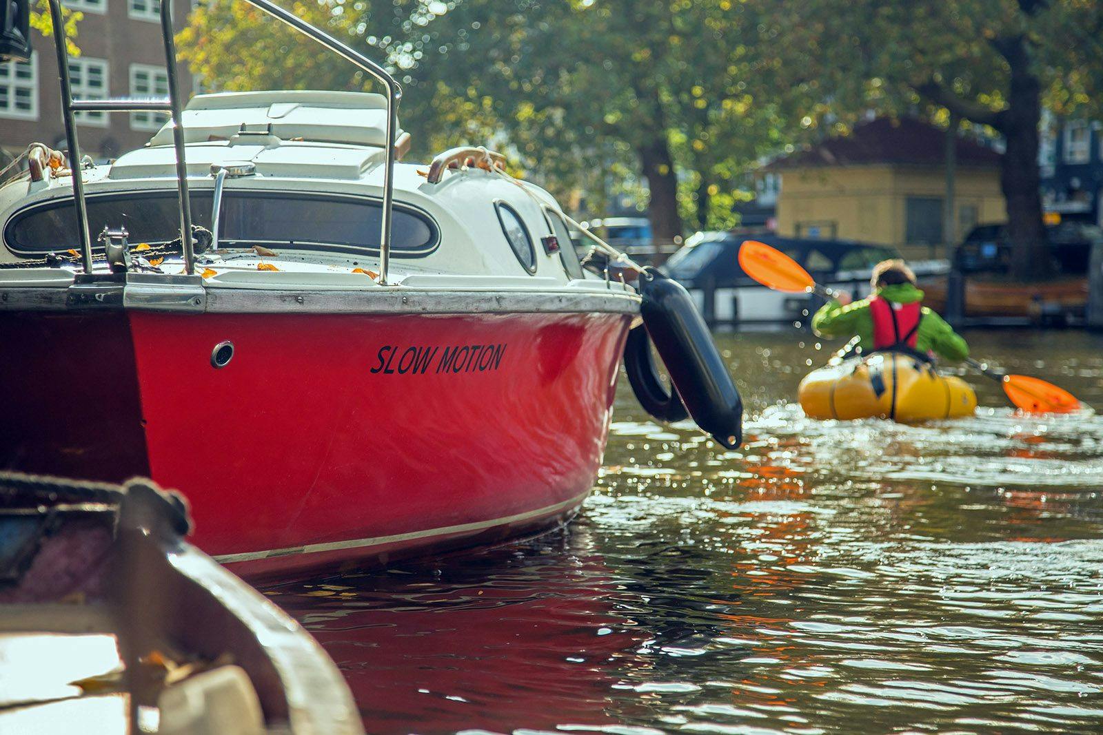 Jacob Hatstrup Haagensen paddling the canals of Amsterdam. Photo by Neil Irwin.