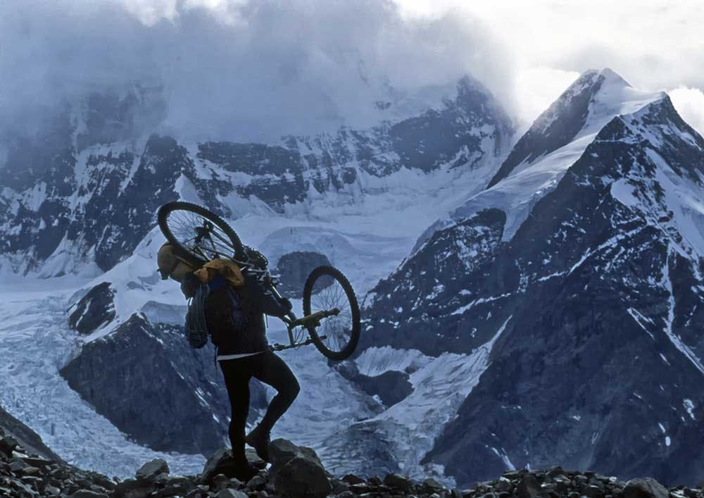 This photo was incorrectly identified as being by Roman Dial in the email. It was taken by Bill Hatcher. &quot;Carrying below the Hayes Range. Alaska&apos;s Alaska Range Mountains. The adventure rs were on a seven-week, 775-mile expedition traveling east to west across Alaska from the Yukon border to the Aleutian Range in Lake Clark National Park and Preserve. (Travel on Black Rapids Glacier.)&quot;