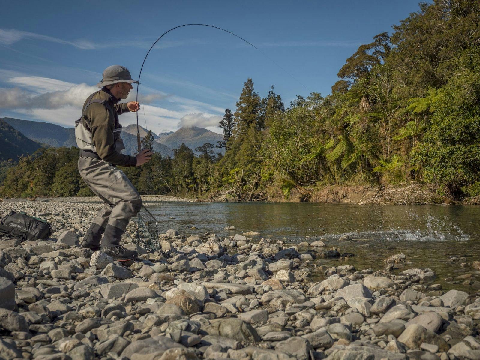 Dan in the latter stages of securing a large South westland brown into the net!