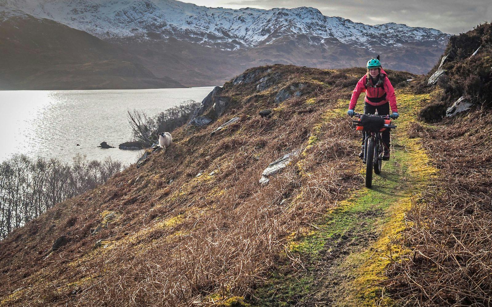 Annie Lloyd-Evans bikerafting across Scotland. Photo: Huw Oliver.