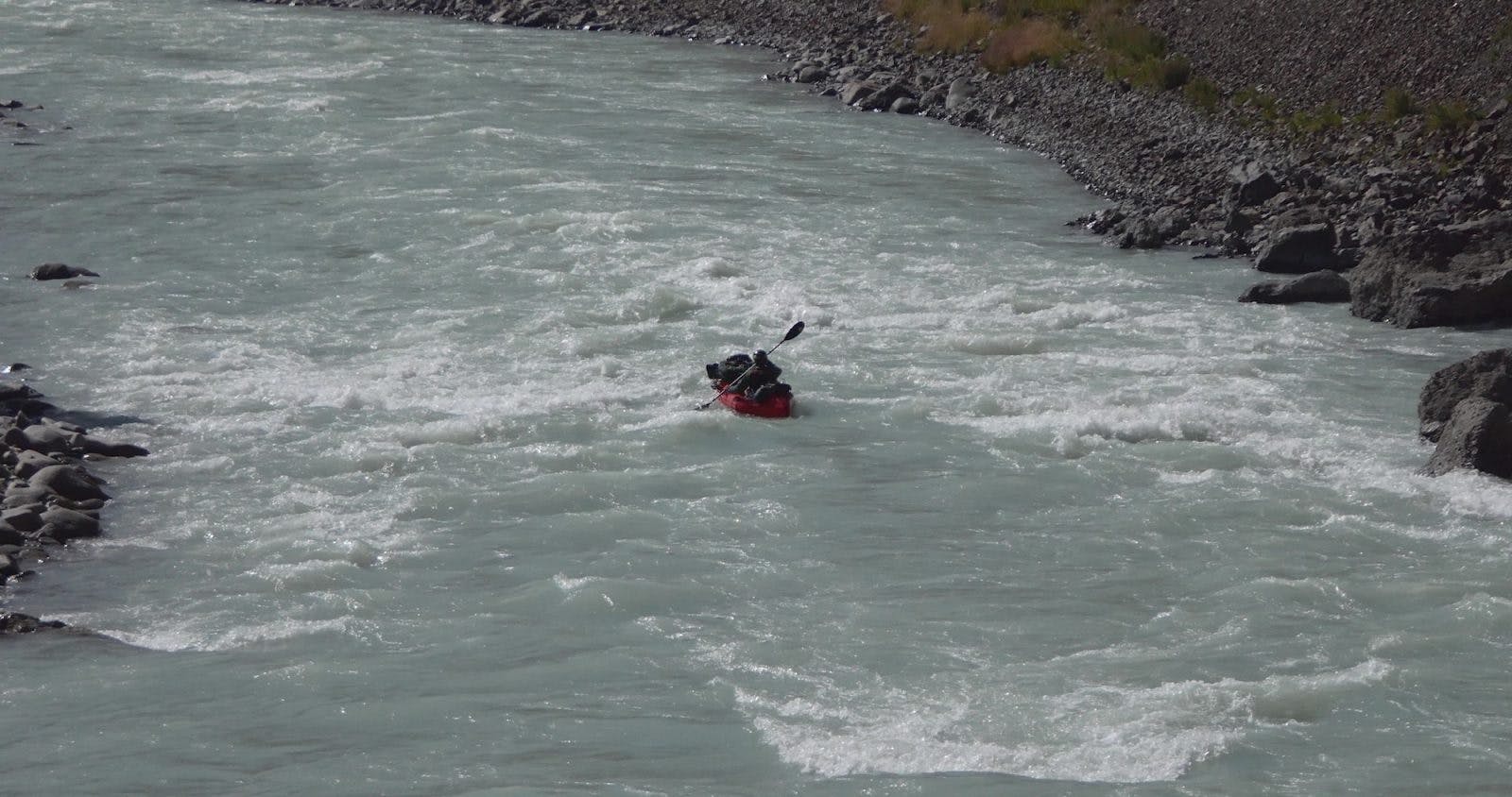 Mike McGrath pack rafting the Naryn River, Kyrgyzstan.