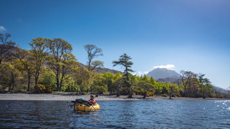 &quot;Loch Maree in the north-west Highlands is home to some of the last remnants of Scotland&#xE2;&#x20AC;&#x2122;s ancient Caledonian forest. In May we used rafts and bikes to access an otherwise fairly unreachable trail which runs underneath Slioch, the peak in the background behind Annie. It&#xE2;&#x20AC;&#x2122;s a rarely visited trail, especially by bikes, and it ran amazingly well after a night spent bivvying at the top, and it eventually spat us out right down by the loch, where we hopped on the water to carry on our way in the sunshine.&quot; Photo: Huw Oliver