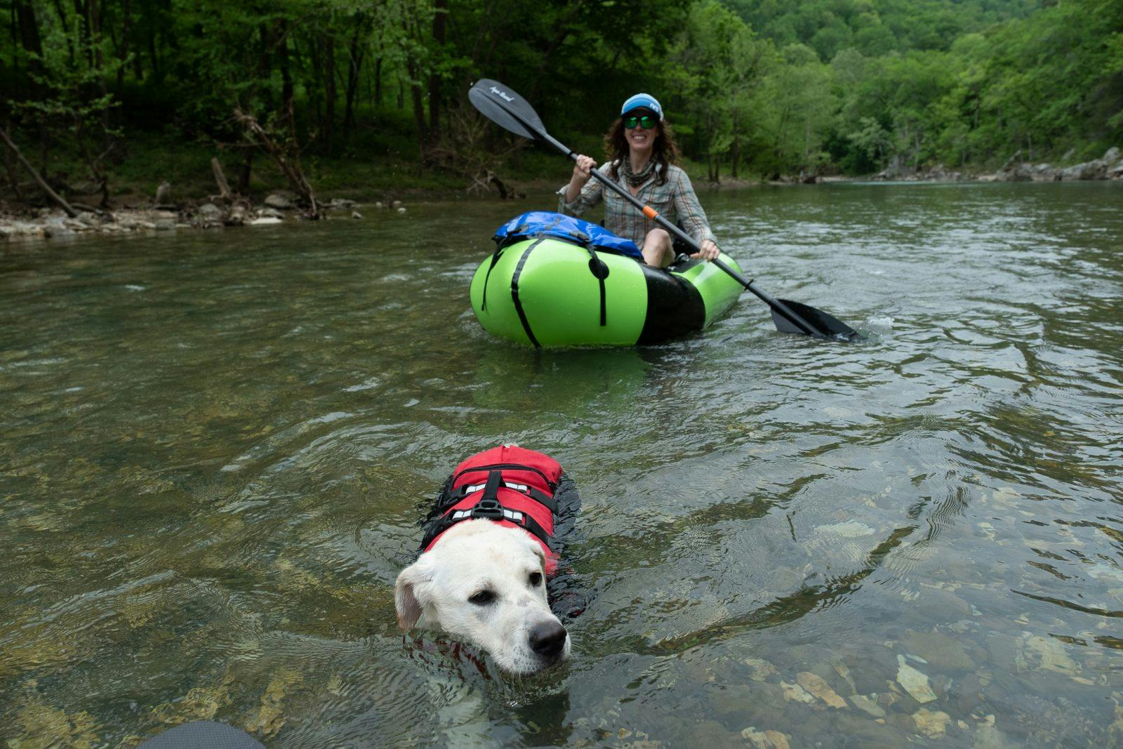 Claire Cripps swimming with Ernie. Photo by Braden Gunem.