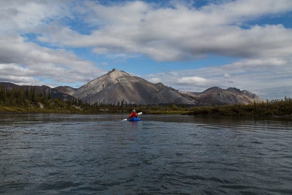 Paddling the Wind River on a calm, gorgeous autumn day, during our two-week human-powered journey from the Dalton Highway to Arctic Village, in the Arctic National Wildlife Refuge. 