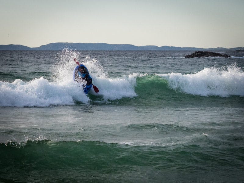 &#x201C;Let my packraft go surfing! Only one thing for it when the surf was up one evening on the island of Colonsay. The rafts surf so easily, and boof their way over incoming waves much better than a kayak. I would love to be able to say that the boat and I became one, a single organic being effortlessly riding the elemental force of the waves. Instead I span around backwards, forwards, sometimes sideways, before getting dumped into the sand at the end. It was brilliant.&#x201D; Photo: Annie Lloyd-Evans