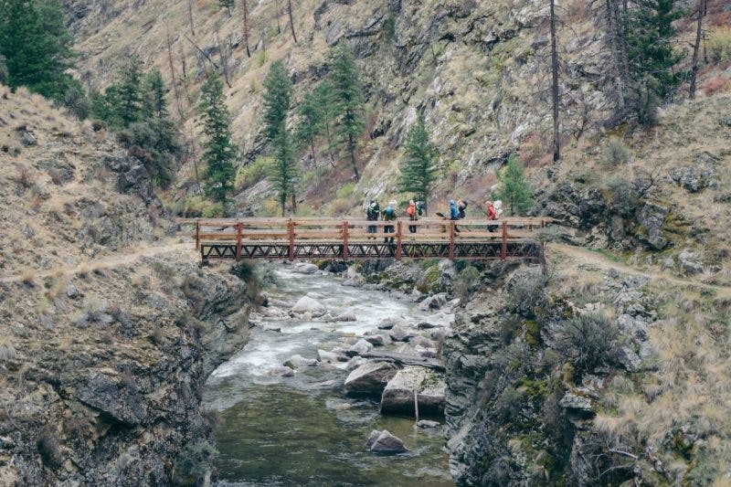 1.Crossing the footbridge over Big Creek, looking at the last major rapid we&apos;d run on the way down.