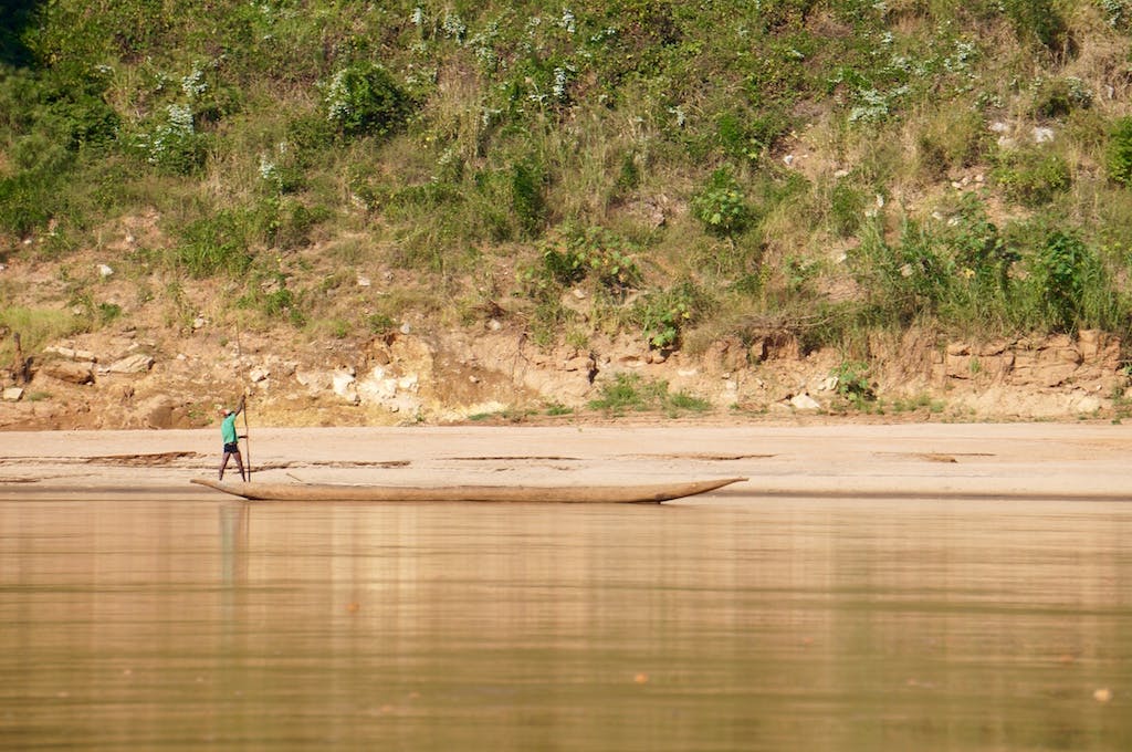 These boat, called pirogues, are the life lines of the river communities. They are incredibly fast and quiet. The boatmen use a canoe paddle to get down stream, and then use a 20-25 foot pole to push themselves back up stream.