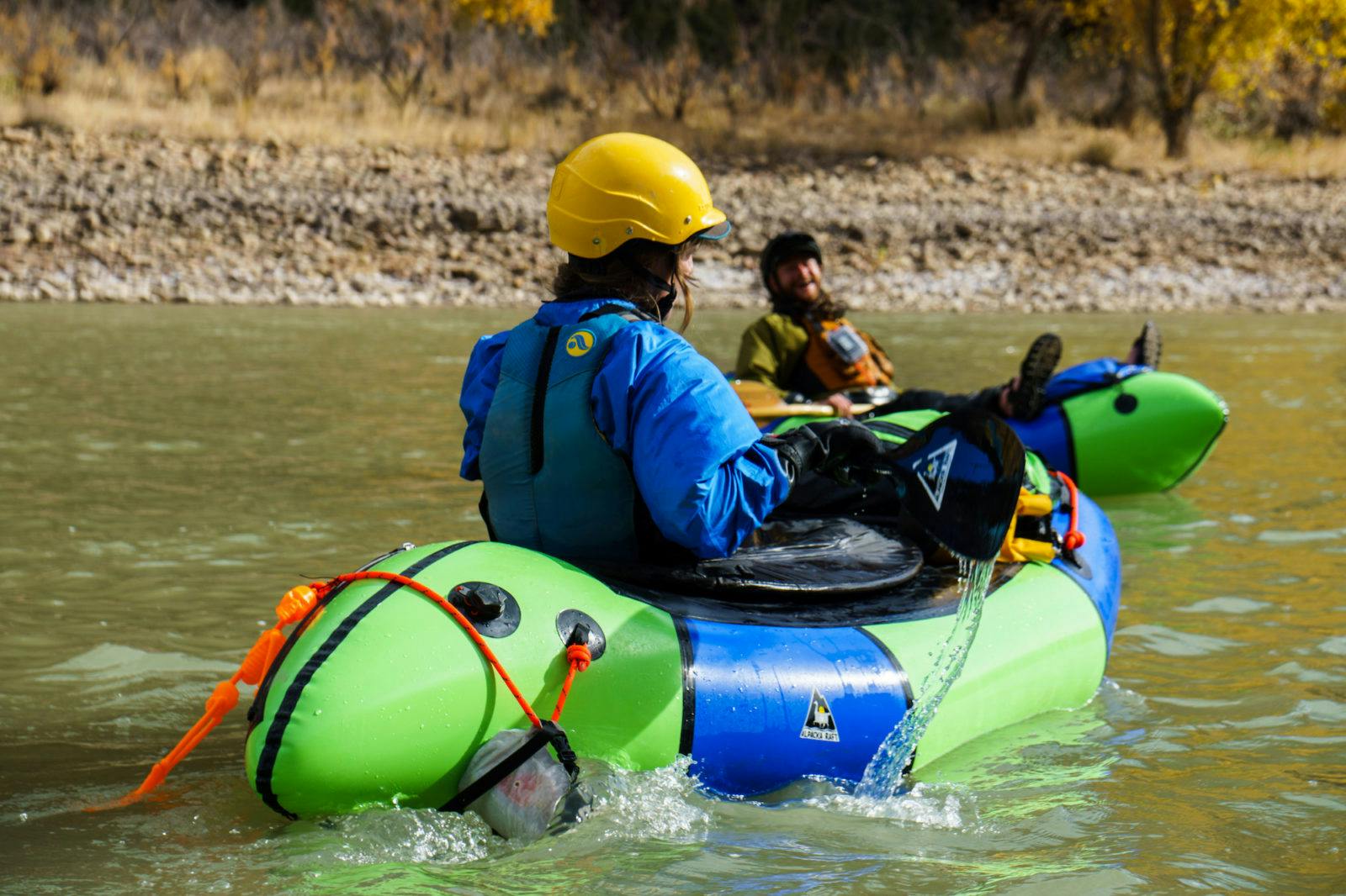 Molly Harrison and Tyler Marlow share a laugh in Desolation Canyon over Halloween 2017. Photo by Thor Tingey.