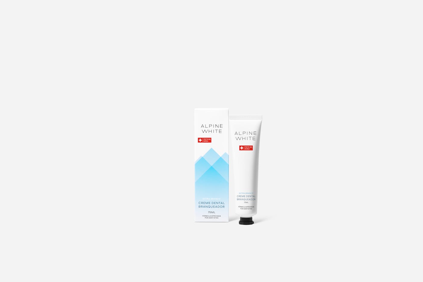 Creme Dental Clareador Extra White ALPINE WHITE com PAP e carvão ativado: clareamento dental seguro, remoção eficaz de manchas profundas e fortalecimento do esmalte. Fórmula suíça, vegana e cruelty-free.