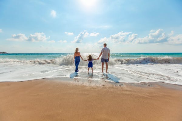 Family enjoying a summer at a beach in Paphos