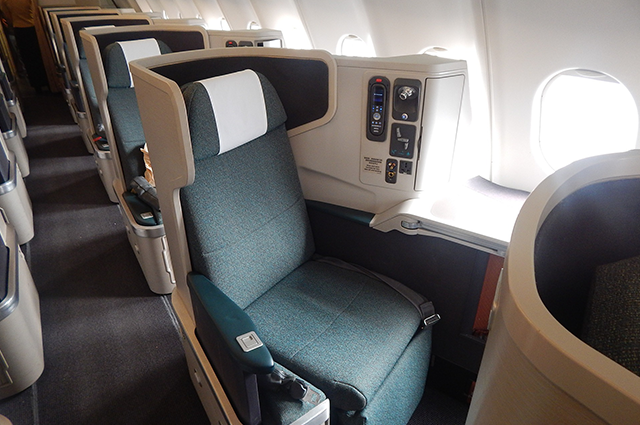 A business class seat onboard a Cathay Pacific aircraft