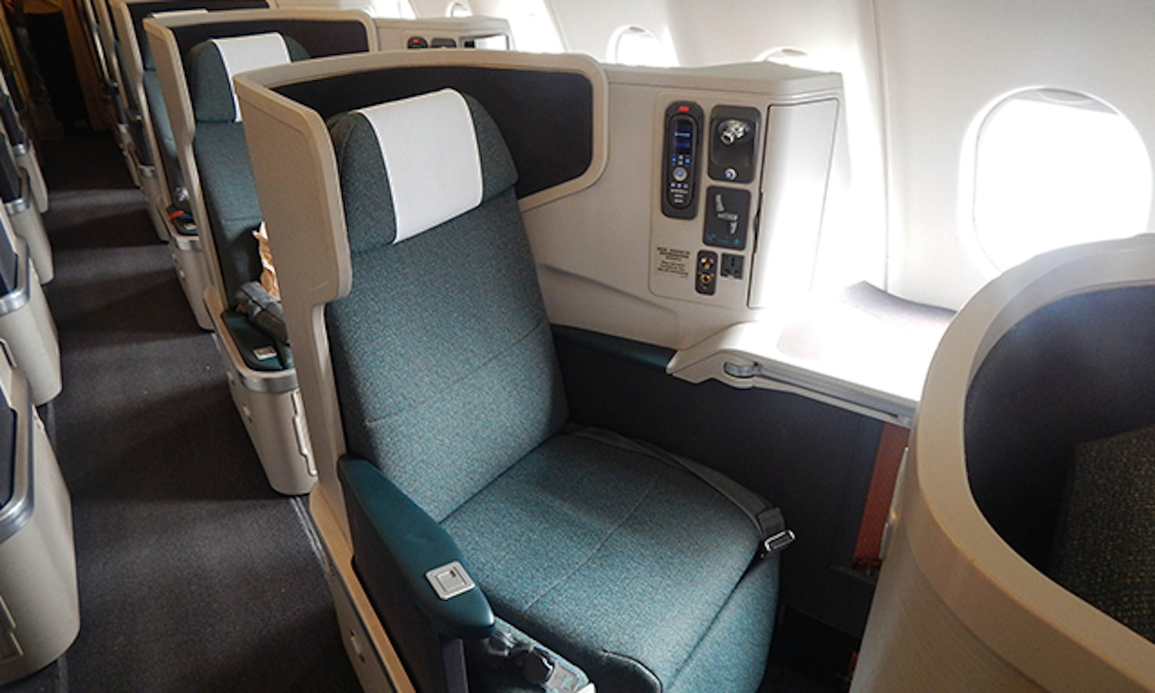 A business class seat onboard a Cathay Pacific aircraft