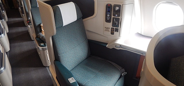 A business class seat onboard a Cathay Pacific aircraft