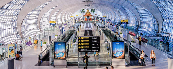 Picture of an airport with people walking around