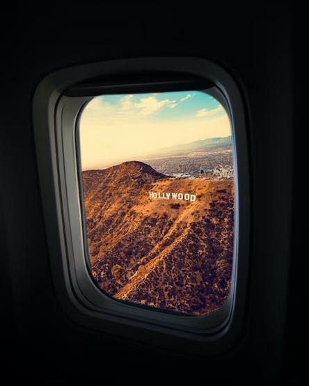 View of the Hollywood sign from airplane window