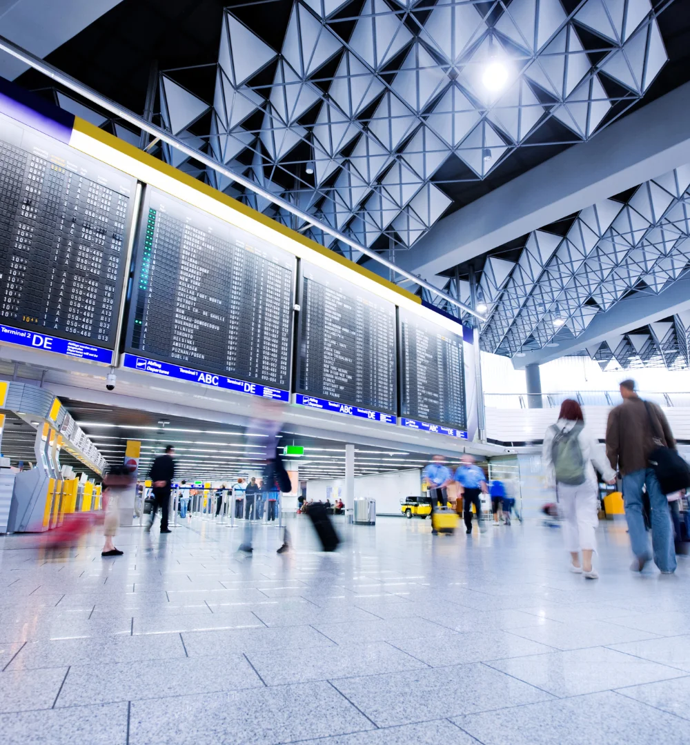 Airport terminal with flight schedule board