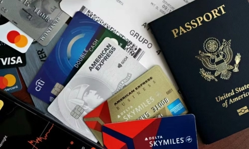 Sky miles card, as well as credit cards alongside a passport